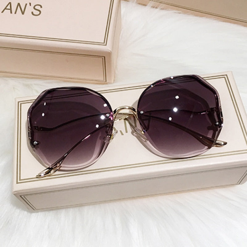 Luxury Round  Rimless Women's Sunglasses
