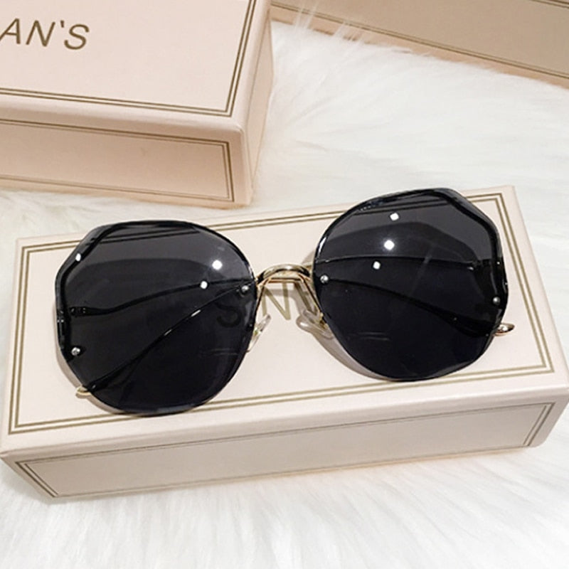 Luxury Round  Rimless Women's Sunglasses